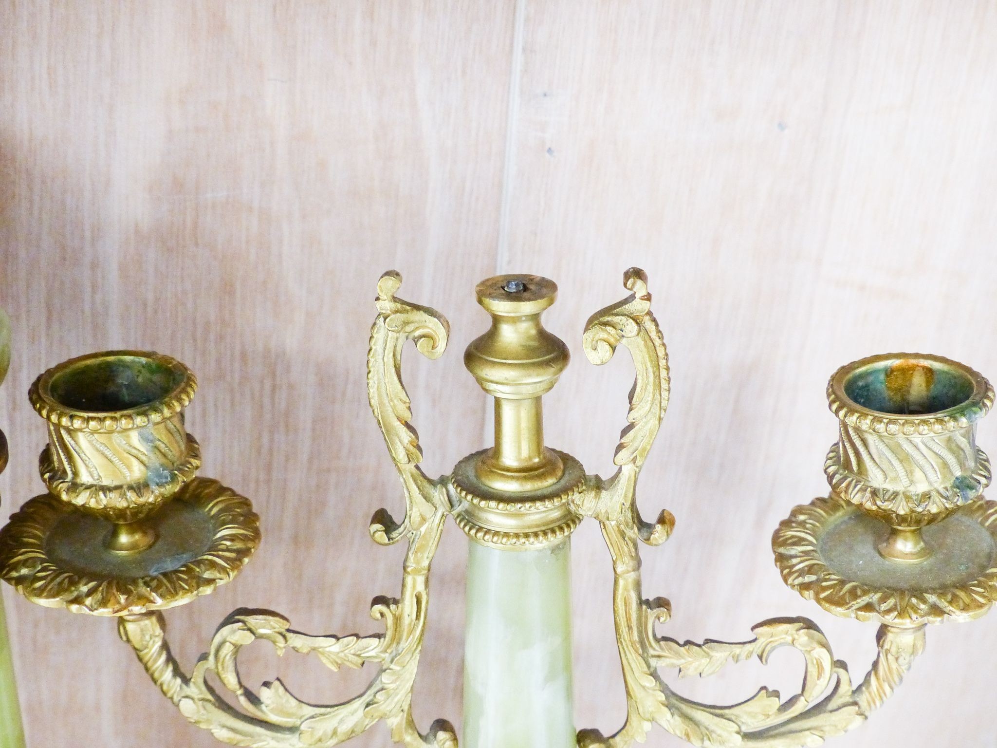 An ormolu and green onyx clock garniture